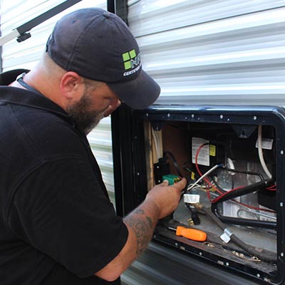 NRVIA Member Inspecting an RV Refrigerator